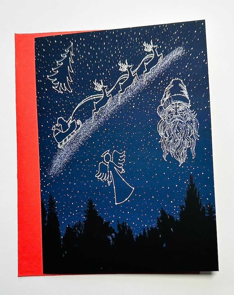 Celestial Night Sky with Santa Face, an Angel, Santa's Sleigh with Reindeer, and Christmas Tree in stars, Christmas Holiday Greeting Card with Red Envelope