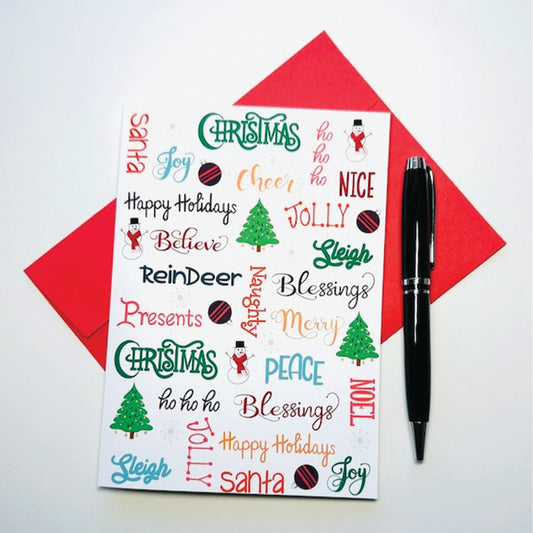 Holiday card with christmas themed words and illustrations with red envelope and black pen on white background
