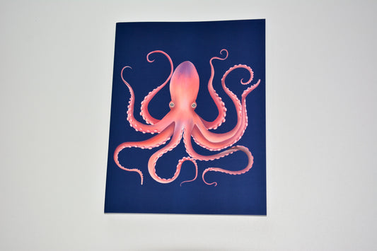 Notebook with a pink, orange and purple octopus design on a blue background